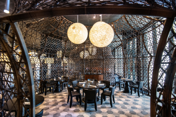 Brandos restaurant French Polynesian dining space with woven design and intimate seating. Brandos restaurant French Polynesian dining space with woven design and intimate seating.