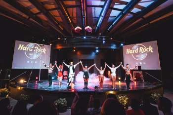 Live stage show with performers and audience at resort theater entertainment venue