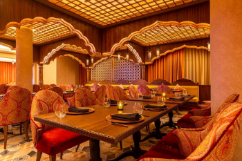 Interior of Agra Indian restaurant at Moon Palace Cancun featuring warm lighting, ornate décor, and upscale dining spaces for destination wedding guests. Interior of Agra Indian restaurant at Moon Palace Cancun featuring warm lighting, ornate décor, and upscale dining spaces for destination wedding guests.