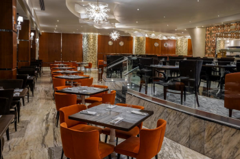 Dining area inside El Manglar buffet restaurant at Moon Palace Cancun with international cuisine and modern seating areas. Dining area inside El Manglar buffet restaurant at Moon Palace Cancun with international cuisine and modern seating areas.