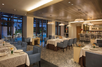 Elegant dining room at L'Etoile, the adults-only French restaurant at Dreams Playa Mujeres