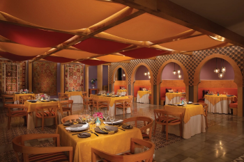 Moroccan-inspired dining room at Mezés, the Mediterranean restaurant at Dreams Playa Mujeres