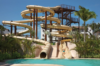 Spiral water slide tower at the Dreams Playa Mujeres waterpark