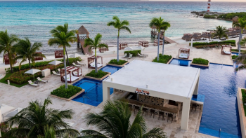 Beachfront pool terrace and cabanas at Hyatt Ziva Cancun along the Caribbean coastline in Cancun