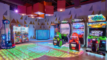 @Moodz Teen Lounge and Club at Hyatt Ziva Cancun with arcade games and a lit dance floor